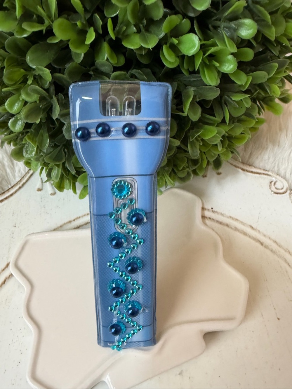 Decorated hand held slim flashlight